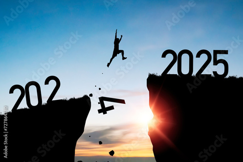 Bild auf Leinwand Welcome merry Christmas and happy new year in 2025,Silhouette Man jumping from 2024 cliff to 2025 cliff with cloud blue sky and sunlight