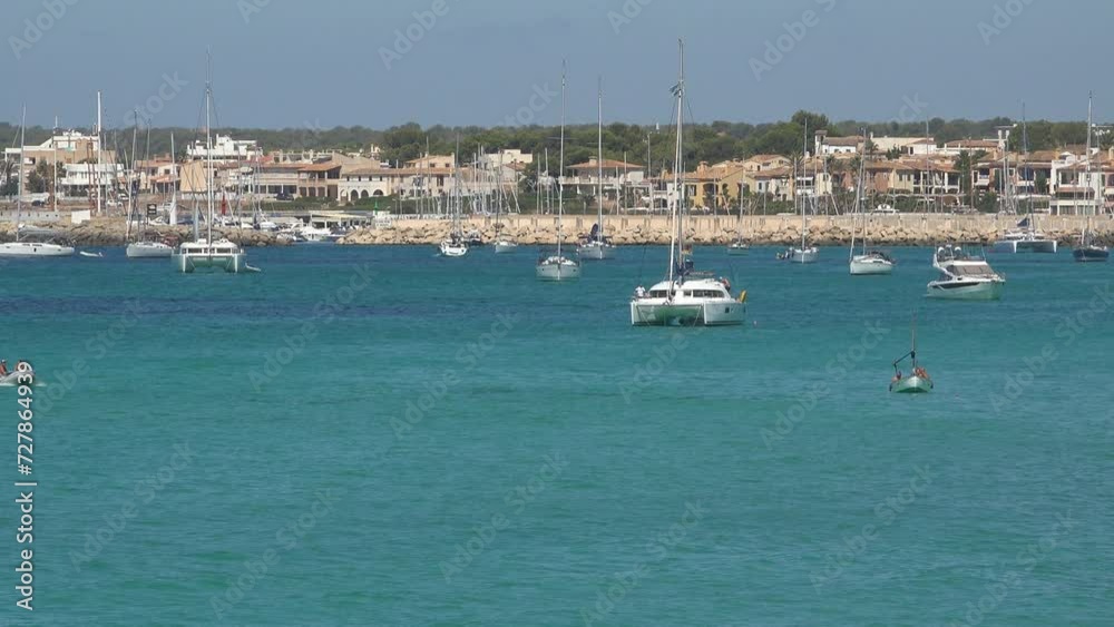 Turquoise sea and yachts near a small harbor in Mallorca island Turquoise sea and yachts near a small harbor in Mallorca island