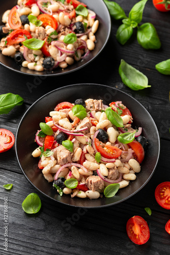 White bean tuna salad with olive, red onion, tomatoes. Healthy food