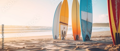 Surfboards on the beach at sunrise. Panoramic image. Surfboards on the beach. Vacation Concept with Copy Space.