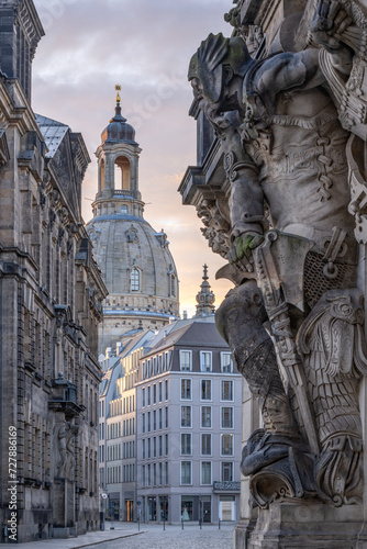 Dresden Frauenkirche (Church of Our Lady) and Georgentor (Georgen Gate) sculpture at sunrise, Saxony, Germany photo