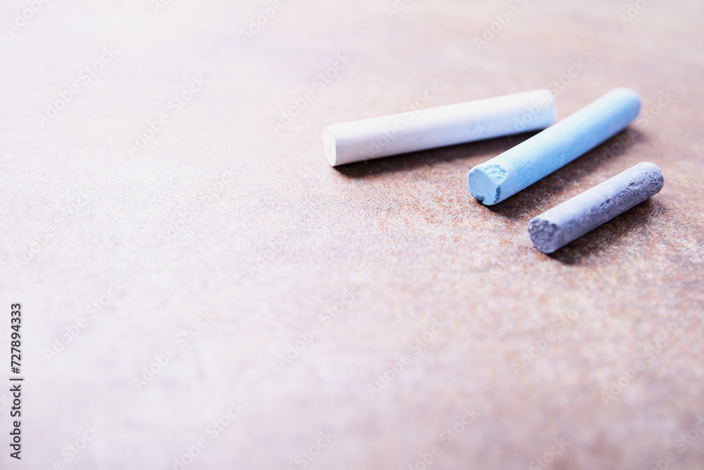 Soft pastels on bright stone background. Soft focus. Close up. Copy space. Soft pastels on bright stone background. Soft focus. Close up. Copy space.