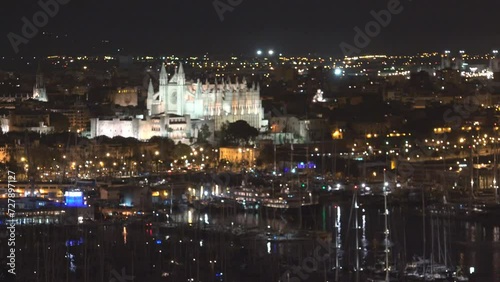 Night panorama of Palma de Mallorca cathedral and harbor photo