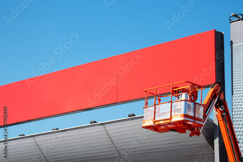 crane cradle on the signboard background photo