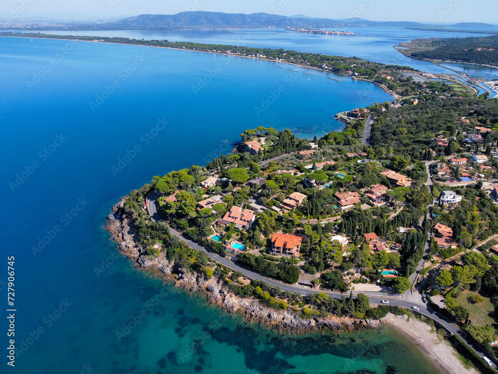 Naklejka premium aerial view of the Argentario coast, in the background the Orbetello lagoon.