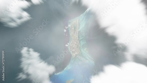 Earth zoom in from space to Cockburn Town, Turks and Caicos Islands. Followed by zoom out through clouds and atmosphere into space. Satellite view. Travel intro. Images from NASA photo