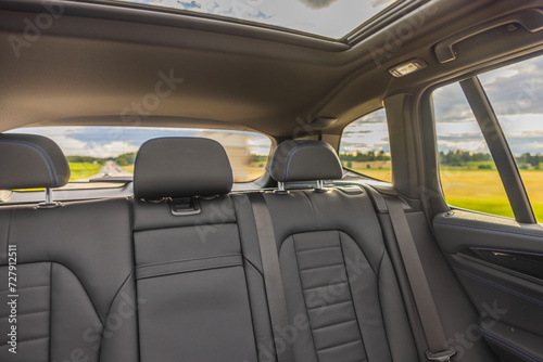 Beautiful view of the interior of the leather rear seats of the car.  © Alex