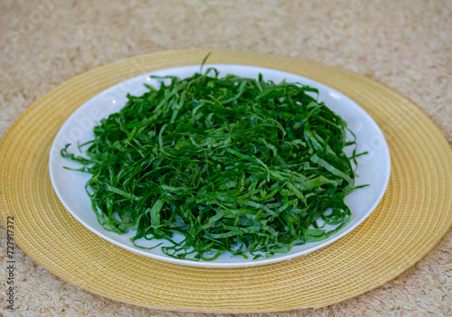 Kale leaves chopped and sliced into thin strips