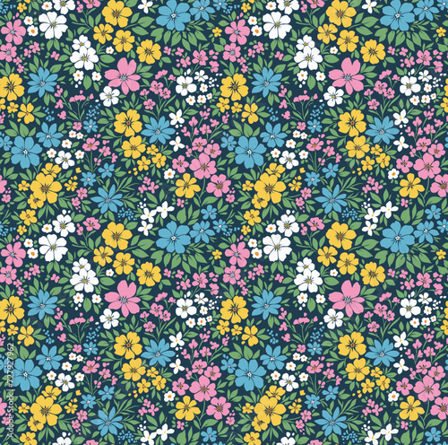 Seamless vector floral pattern. Liberty background of bright colorful flowers. Print with bouquets of flowers from the garden. Bright yellow, white and pink flowers, dark blue background.