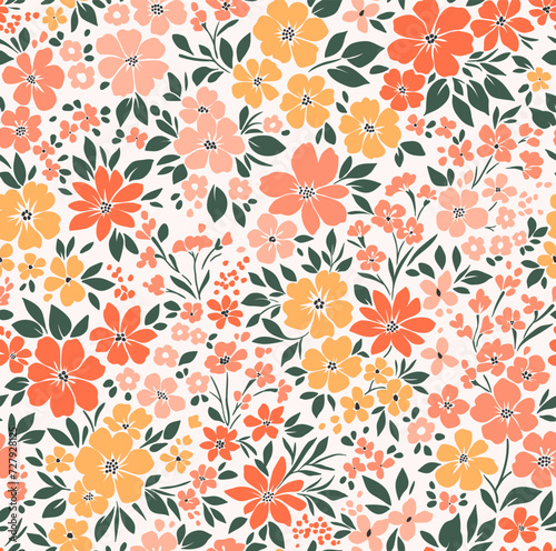 Beautiful floral pattern in small abstract flowers. Small yellow and orange flowers. White background. Ditsy print. Floral seamless background. Seamless decorative elegant pattern with cute flower.