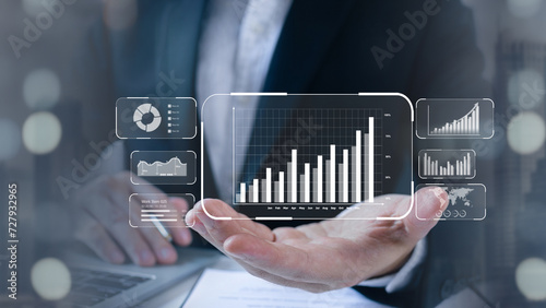 Business strategy and Global economy, businessman using a computer and dashboard for business growth graph data and progress, planning analyze Investment.
