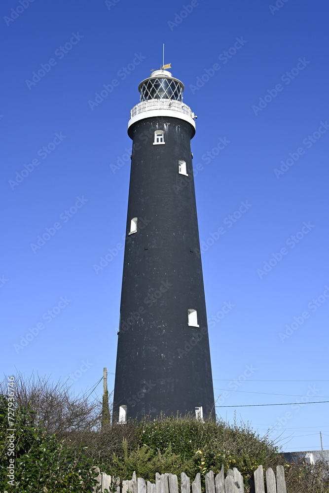 Lighthouse on the British coast - nautical navigation.