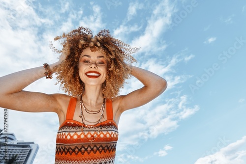 Smiling Woman Dancing on the Beach: A Hippie Journey of Happiness