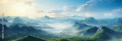 A hazy sunrise softly illuminates a series of rolling hills and valleys, evoking a sense of calm and majesty