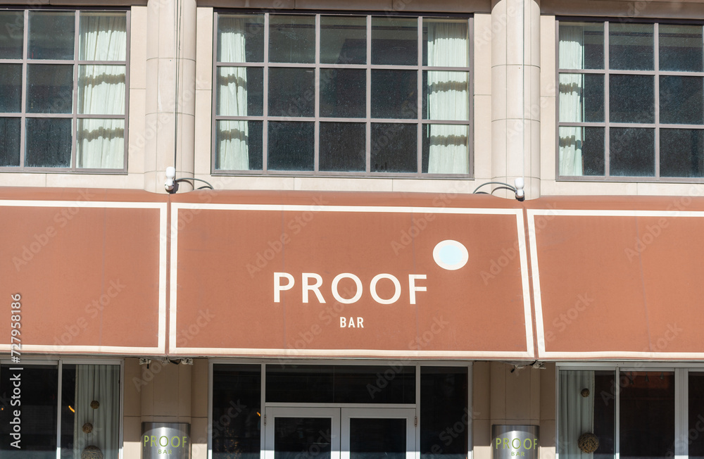 exterior facade and sign of Proof Bar & Patio located on the first