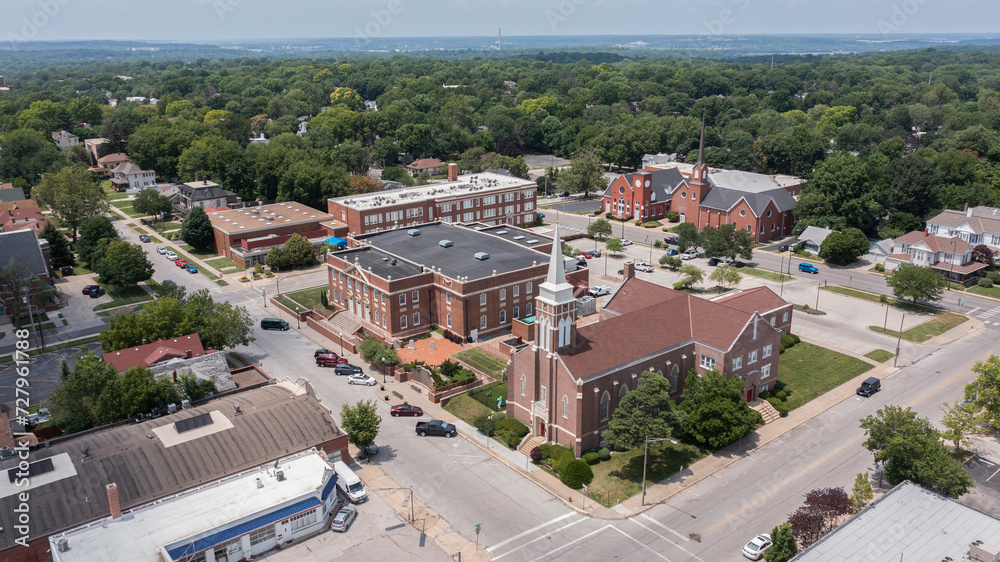 Independence, Missouri, USA - June 16, 2023: Afternoon sunlight shines on the historic core of downtown Independence.