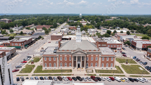 Independence, Missouri, USA - June 16, 2023: Afternoon sunlight shines on the historic core of downtown Independence.