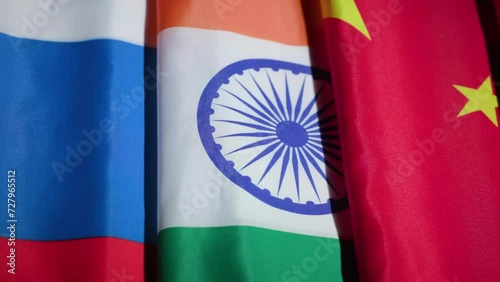 Panning shot of BRICS Nations Brazil Russia India China South Africa on dark background