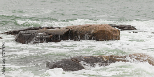 Wave crashing on rocks