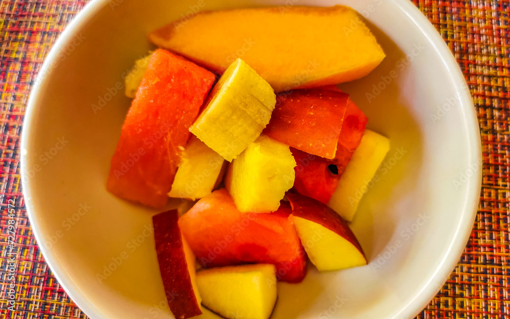 Fruit in bowl for breakfast watermelon apple strawberry mango banana. Fruit in bowl for breakfast watermelon apple strawberry mango banana.
