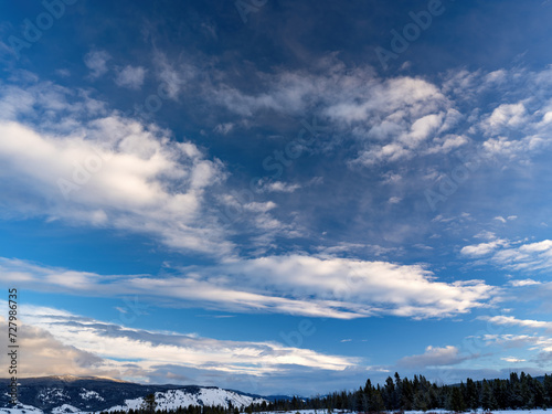 Cloudscape in winter with blue sky © knowlesgallery