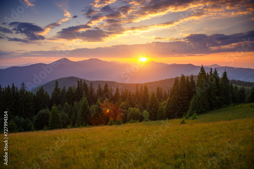 Breathtaking views of the mountain range under the colorful sky. Carpathian National Park, Ukraine.