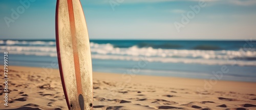 Low angle view of surfboard on sandy beach during sunny day. Surfboards on the beach. Vacation and Travel Concept with Copy Space.