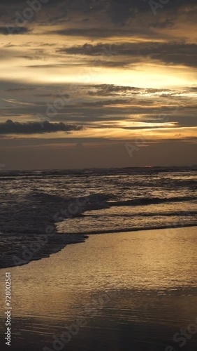 beautiful evening beach view before sunset with small waves on Cipatujah Tasikmalaya beach photo