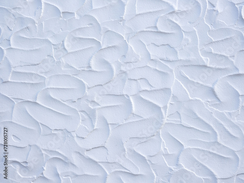 Fototapeta Naklejka Na Ścianę i Meble -  White plastered wall background, irregular stroke shapes