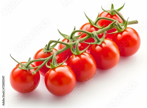 Fresh, ripe tomatoes on the vine, isolated on a white background.