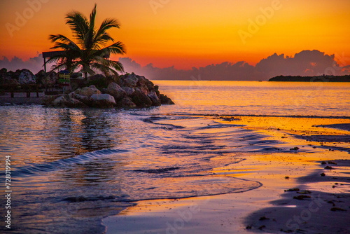 Sunrise over serene landscape with vibrant colors