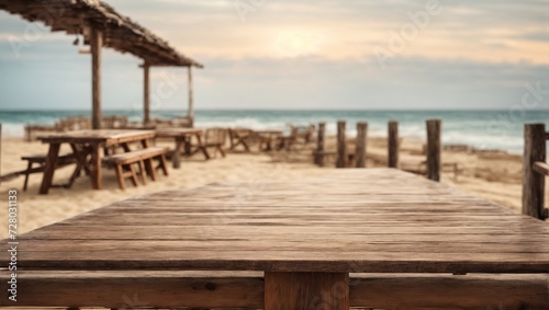 long wooden table with beach landscape blur background 