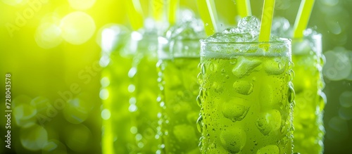 Refreshing Green Energy Drink Sod Pops Against Vibrant Background