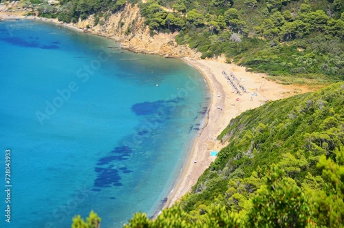 Aerial view of estuary like beach at turquoise water sea in Greece, Island of Skiathos