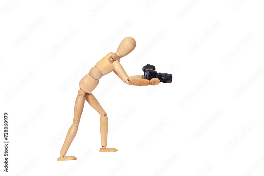 Wooden figure of a mannequin with a camera on a white isolated background...
