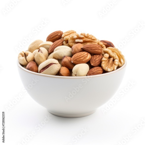 Bowl full of nuts dry fruits isolated on white background