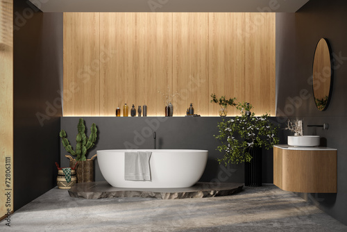 Comfortable bathtub and vanity with basin standing in modern bathroom black and wooden walls and concrete floor.Side view.