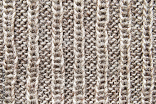 Brown ribbed knit fabric pattern close up as background