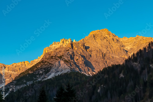 Scenic sunrise view of majestic mountain peak of Dreischusterspitze in untamed Sexten Dolomites, South Tyrol, Italy, Europe. Hiking in panoramic Fischleintal (Val Fiscalina), Italian Alps. Wanderlust photo