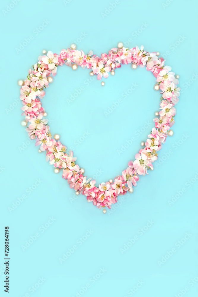 Heart shaped wreath with apple blossom flowers for Spring Beltane and Easter with oyster pearls. Abstract floral minimal design for birthday Mothers Day card, logo, gift tag or invitation on blue. 