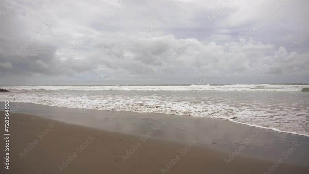 beautiful beachside view, natural panorama, with sea water and beach waves with cloudy skies in the afternoon, at Karang Paranje beach, Garut beautiful beachside view, natural panorama, with sea water and beach waves with cloudy skies in the afternoon, at Karang Paranje beach, Garut