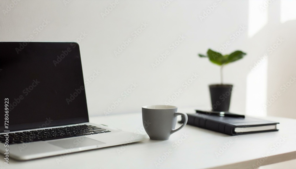 Fototapeta premium office desk table with laptop and cup