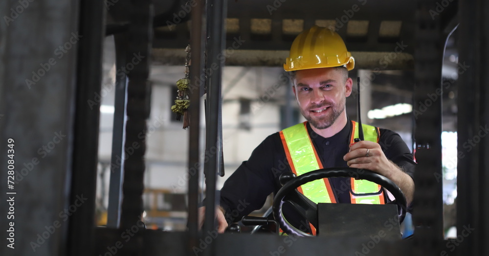 worker or engineer working in factory with safety uniform , safety hat and safety glasses , image is safety concept or happy workplace worker or engineer working in factory with safety uniform , safety hat and safety glasses , image is safety concept or happy workplace