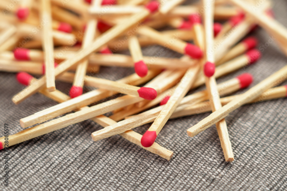 Household matches pile with red heads