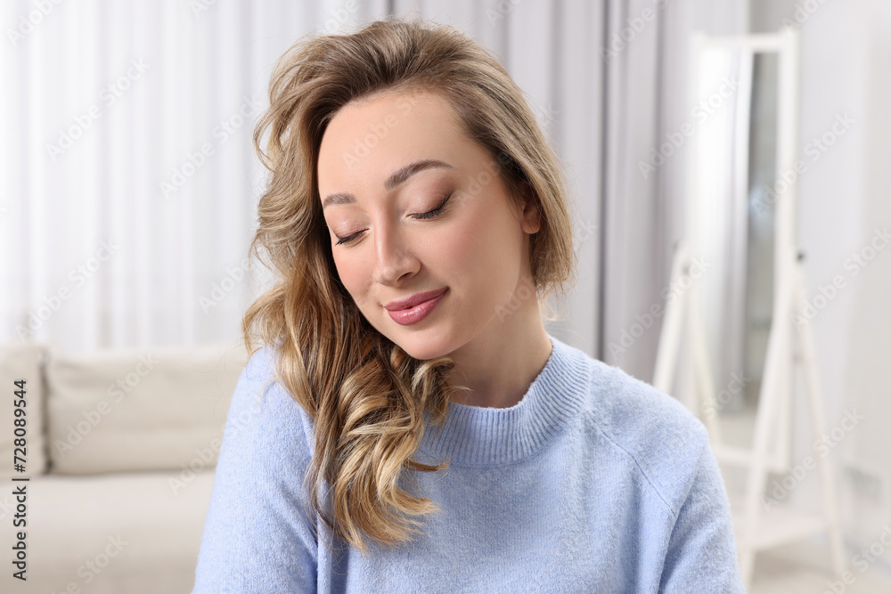 Portrait of beautiful woman with curly hair at home Portrait of beautiful woman with curly hair at home