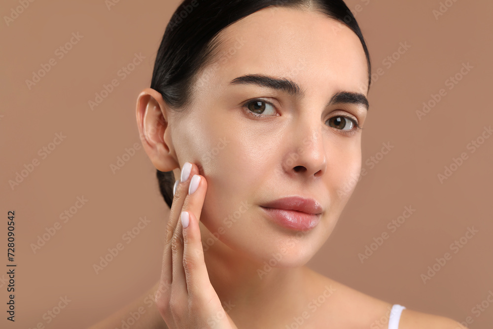 Woman with dry skin on beige background, closeup