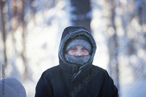 Wallpaper Mural Young Boy in Snow With Hooded Jacket Torontodigital.ca