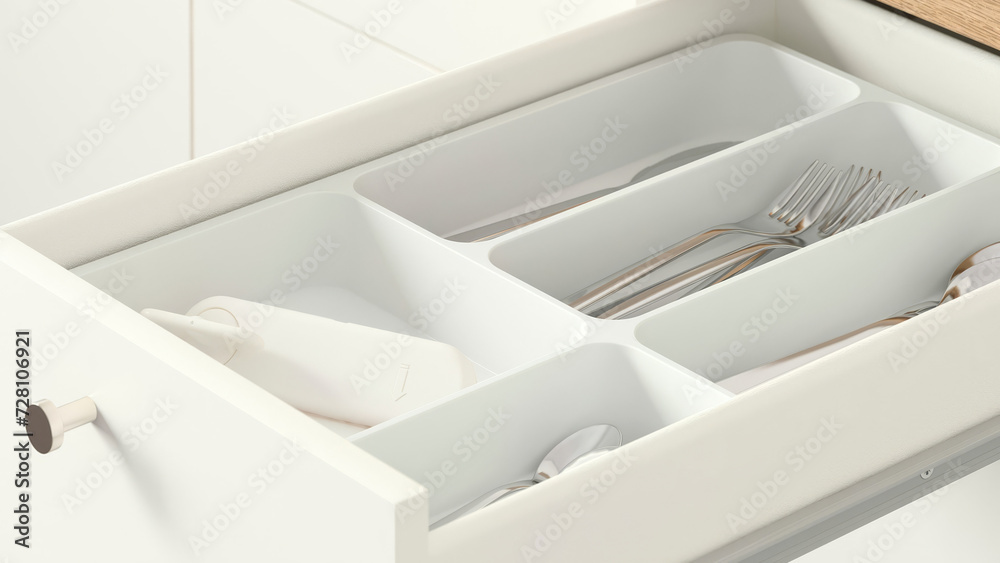 Closeup of open drawer with kitchen cutlery. Closeup of open drawer with kitchen cutlery.