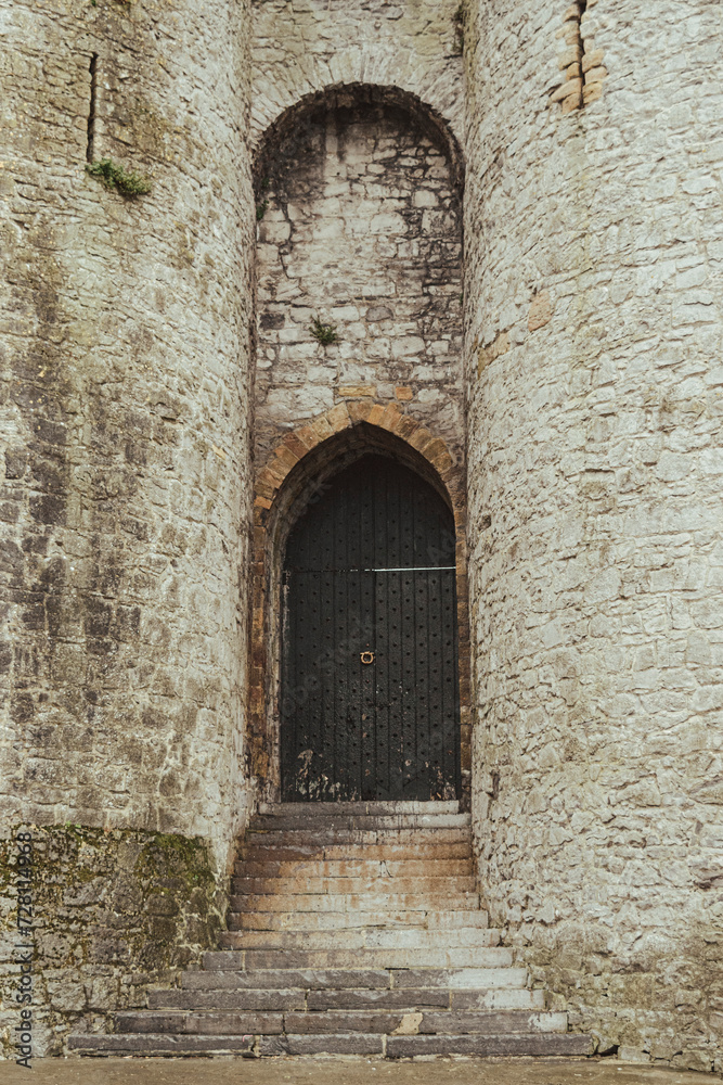 Old black door of John's Castle in Limerick, Ireland