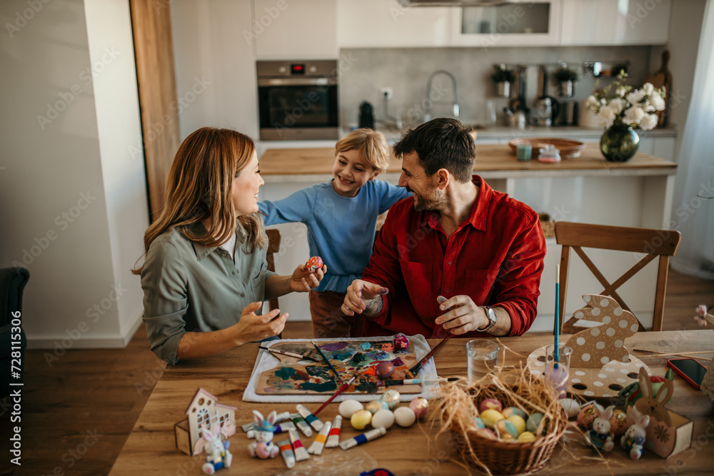 Fototapeta premium Loving family preparing for an Easter at home